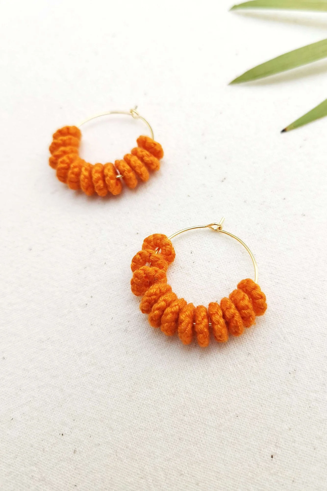Orange pom 2025 pom earrings
